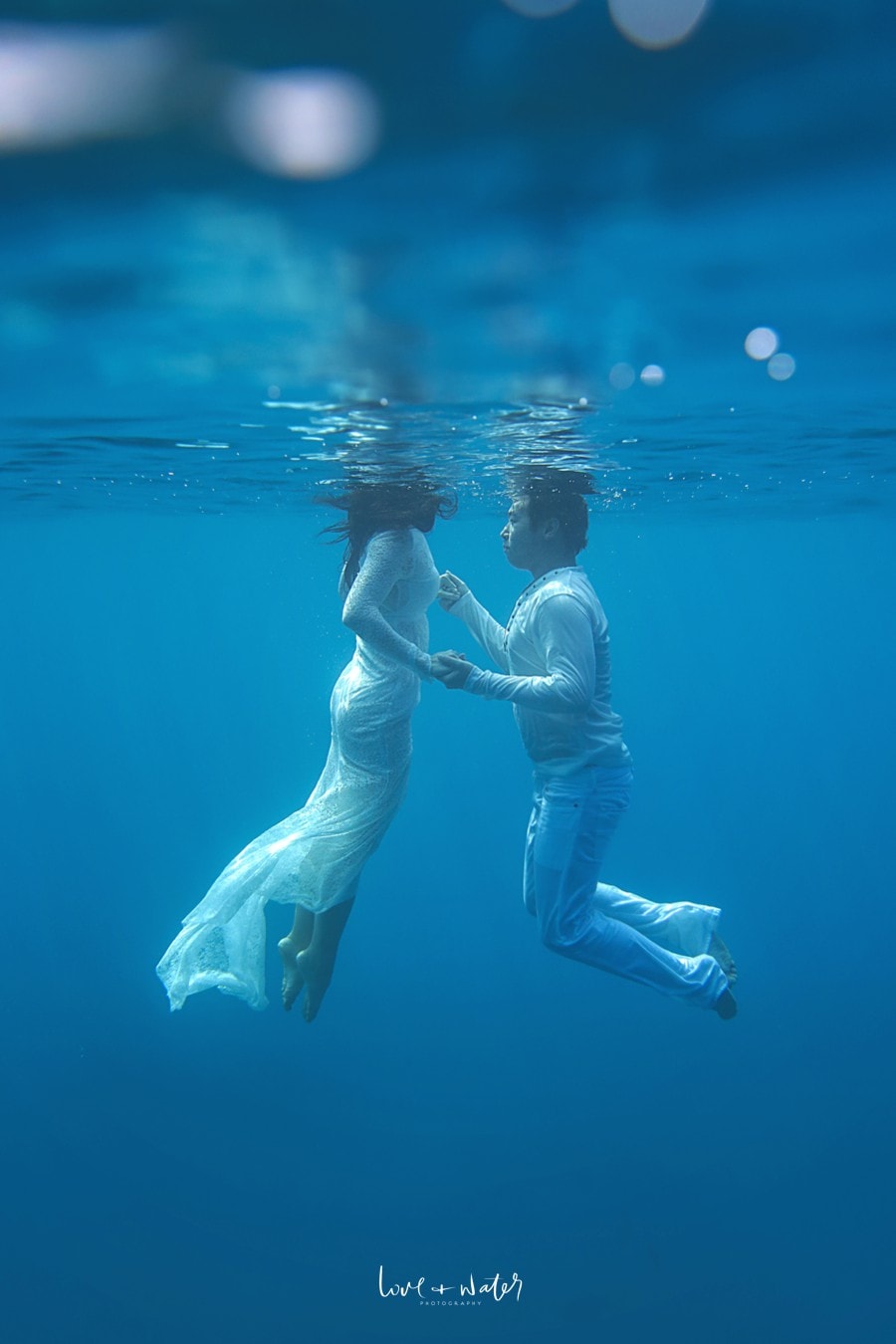 Underwater Photography Trash the Dress on Maui Love + Water Photography